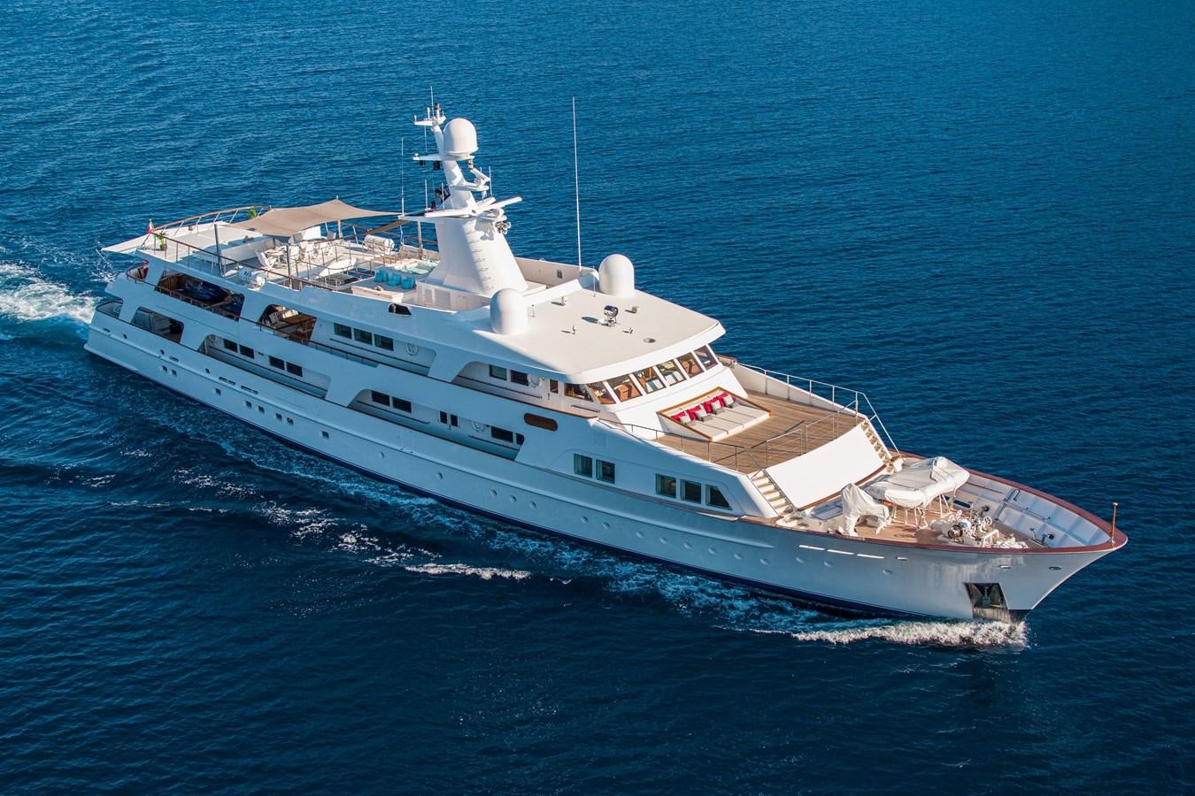 a large ship in the water aboard ILLUSION I Yacht for Sale