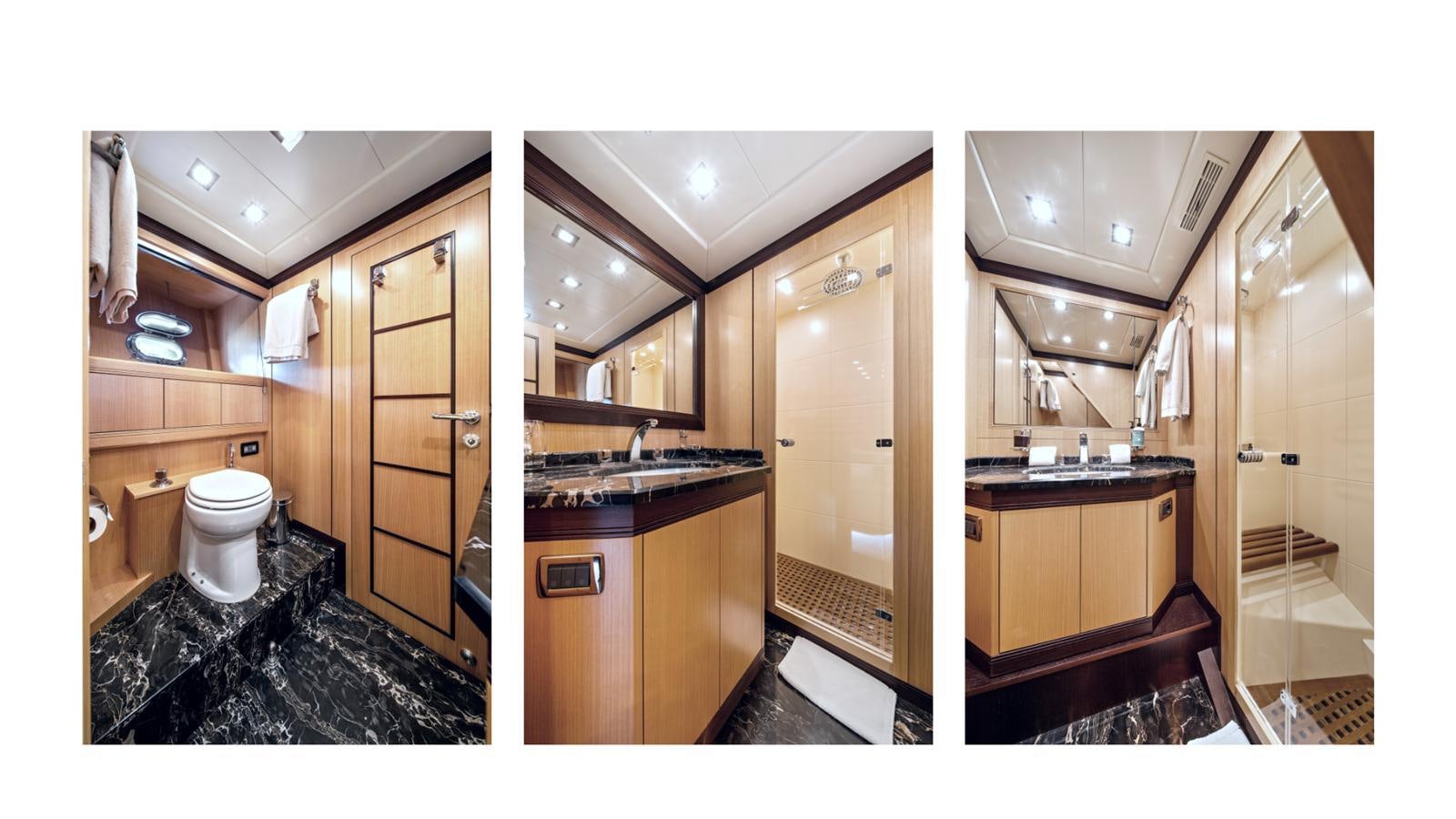 a bathroom with a large mirror aboard DAYA Yacht for Sale