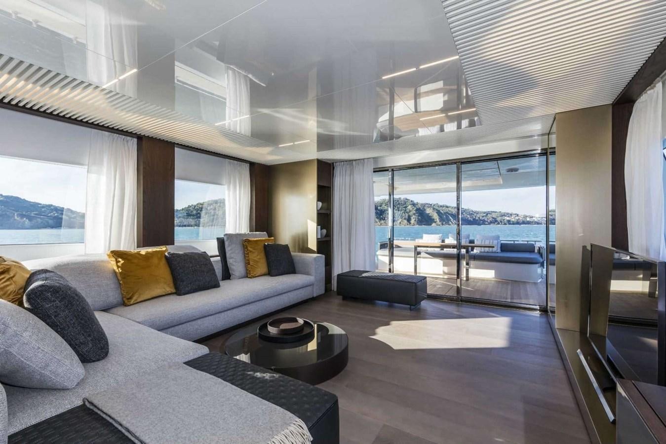 a living room with a large window aboard LADY G Yacht for Sale