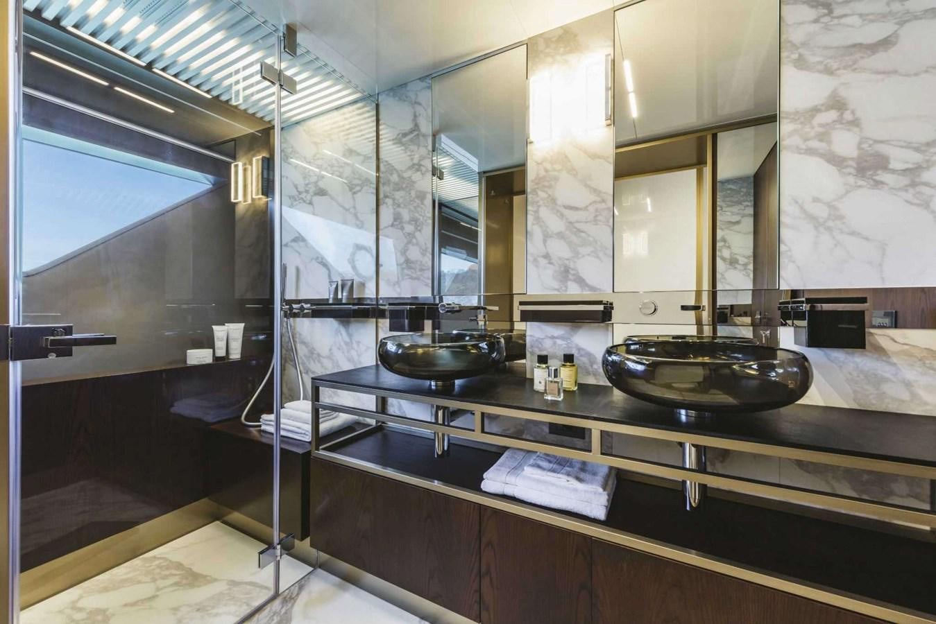 a kitchen with a sink and a mirror aboard LADY G Yacht for Sale