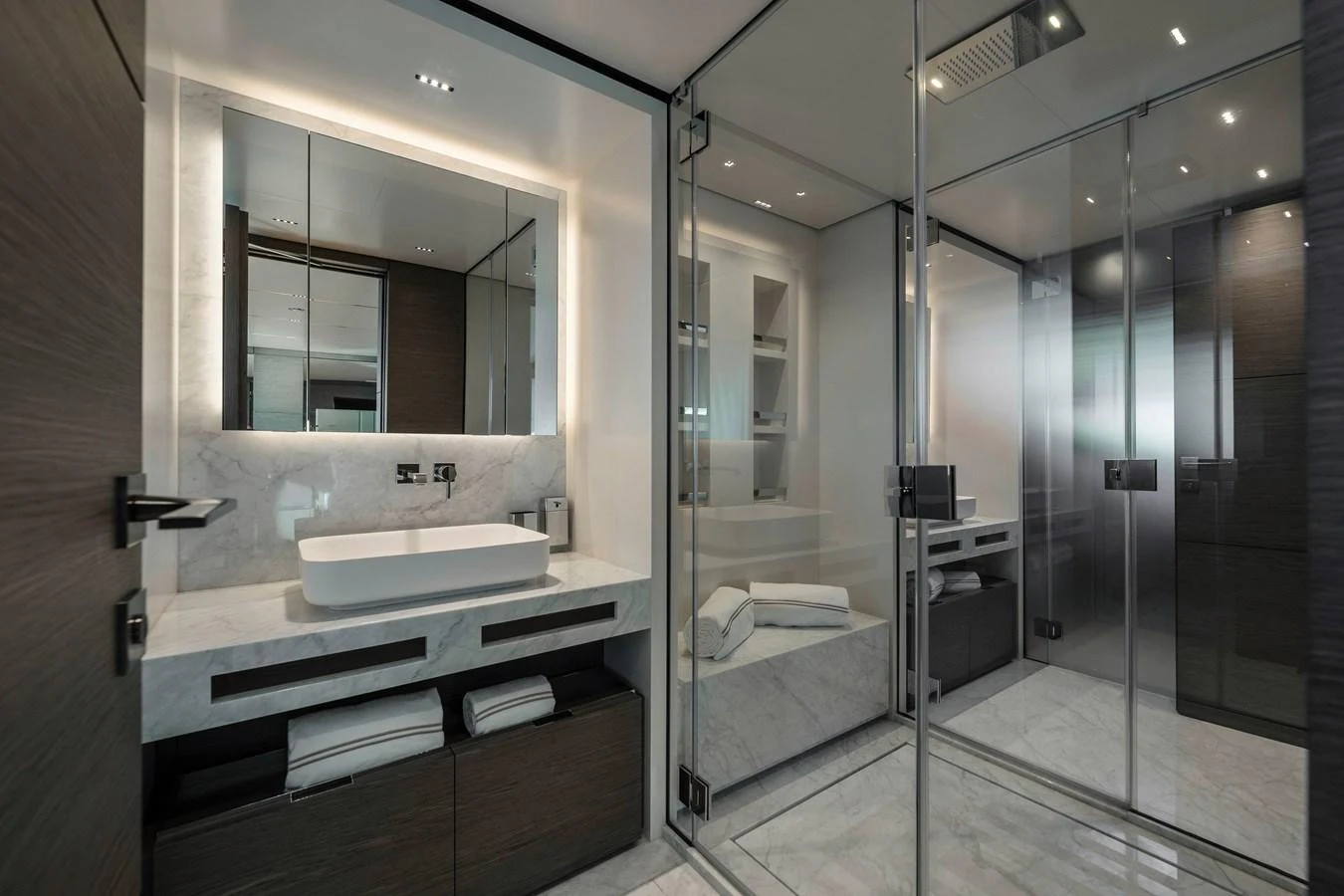 a bathroom with a large mirror aboard REGINA Yacht for Sale