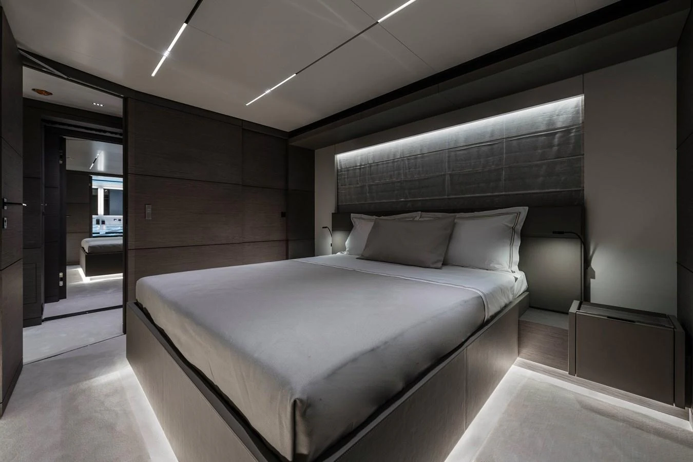 a bed in a room aboard REGINA Yacht for Sale