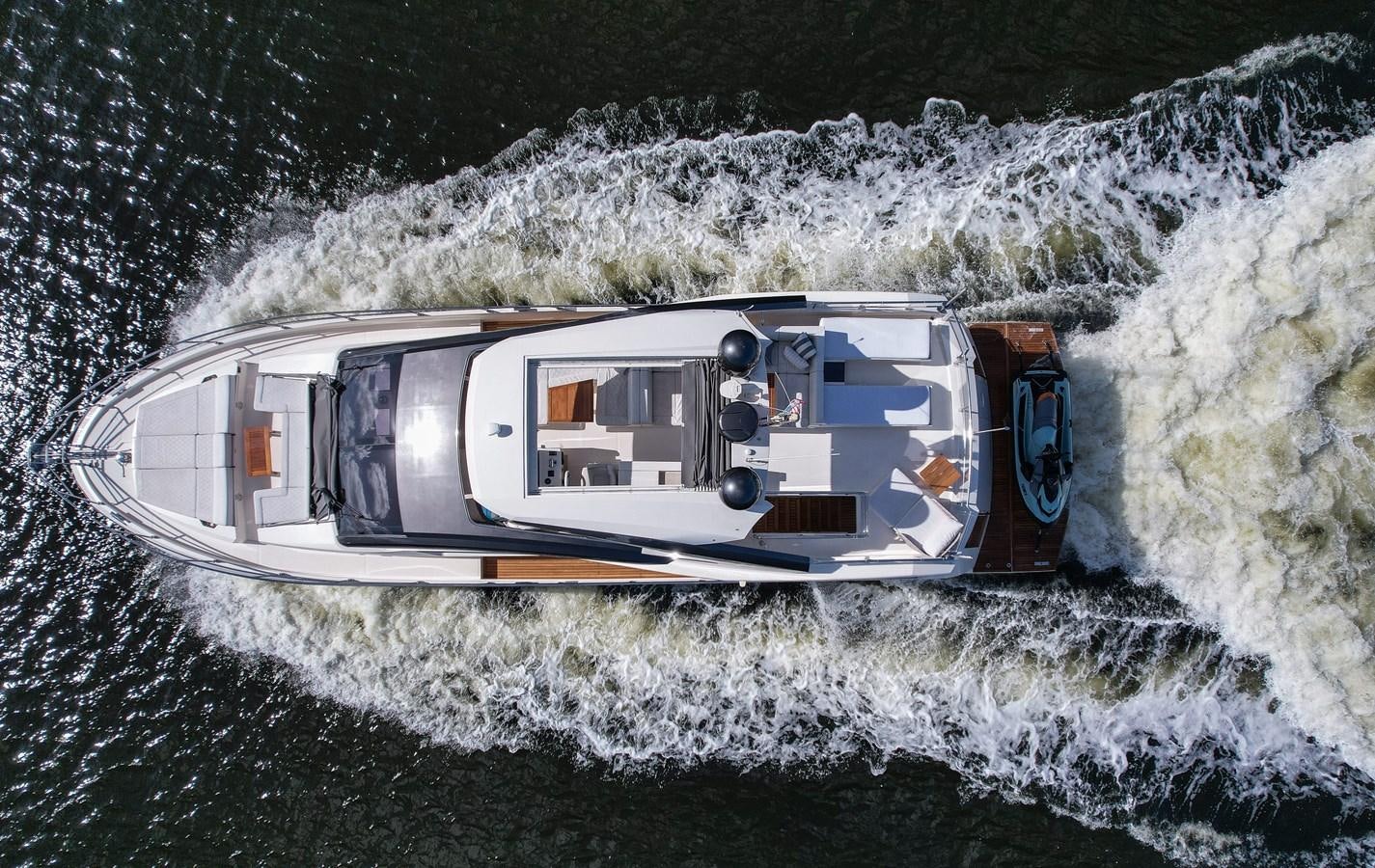 a white vehicle on a snowy hill aboard SHEVA Yacht for Sale