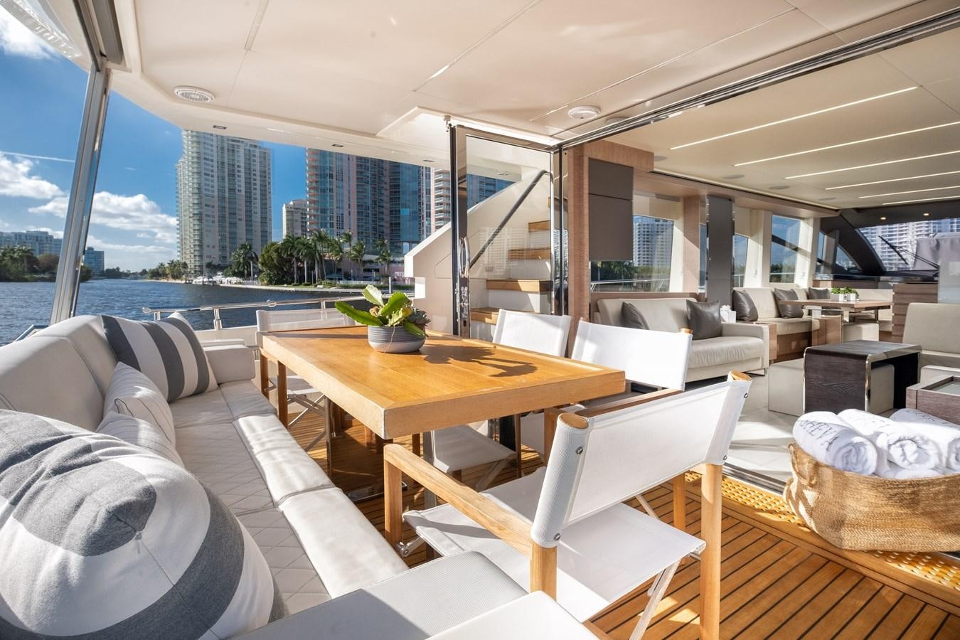 a room with a table and chairs aboard SHEVA Yacht for Sale
