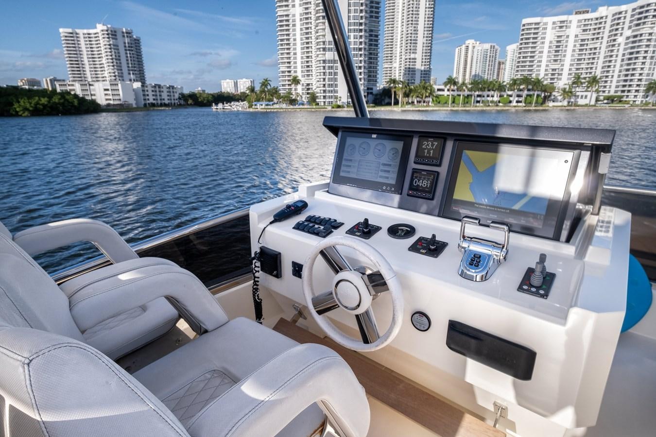 a boat with a view of a city and water aboard SHEVA Yacht for Sale