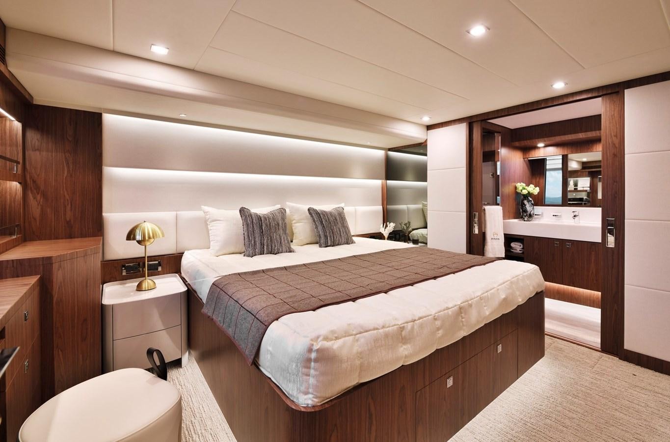 a bed in a room aboard HORIZON V77 CMY / AVAILABLE NOW Yacht for Sale