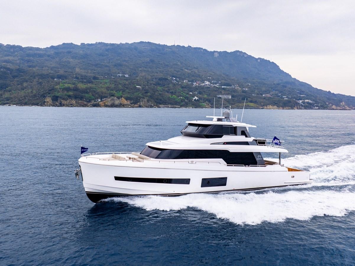 a white yacht on water aboard HORIZON V77 CMY / AVAILABLE NOW Yacht for Sale
