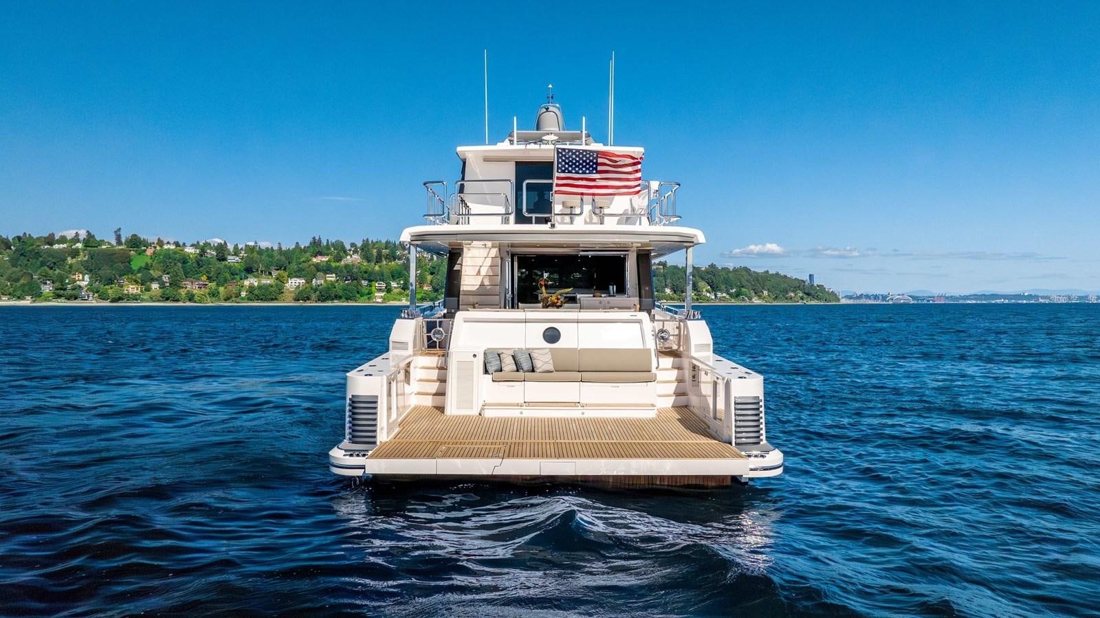 a boat on the water aboard HORIZON V77 CMY / AVAILABLE NOW Yacht for Sale