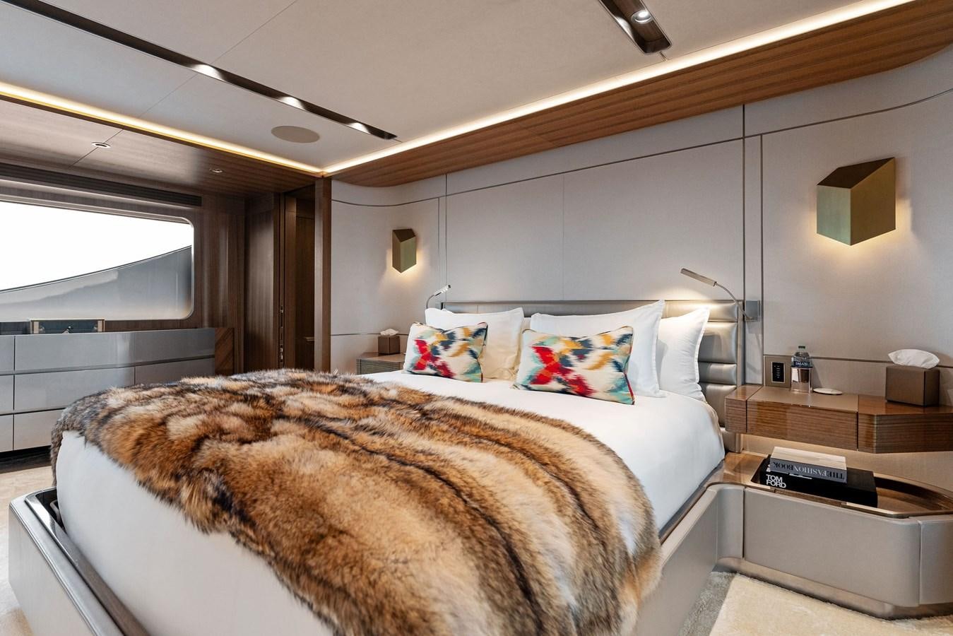 a bed in a room aboard SERENITY Yacht for Sale