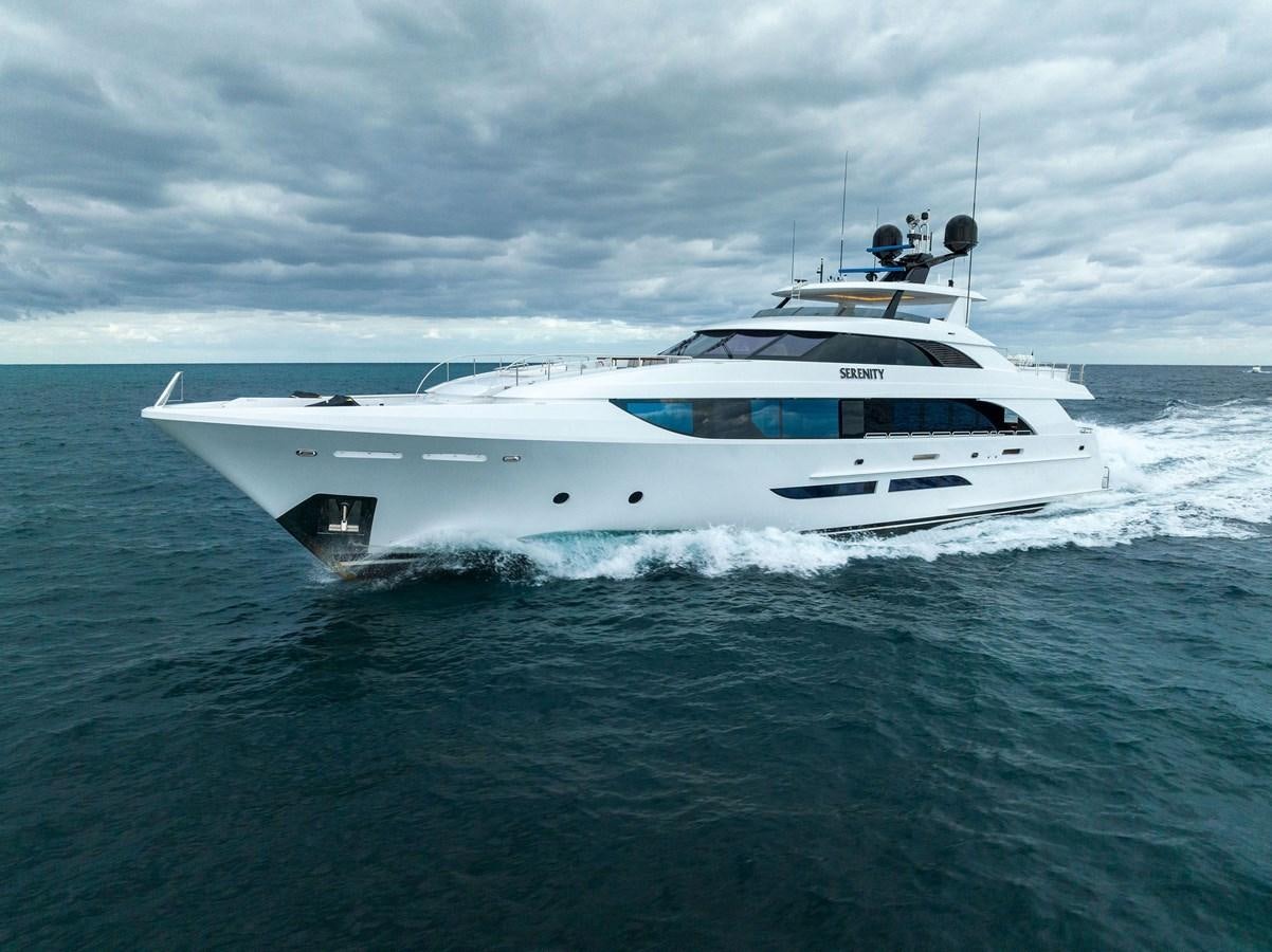 a white yacht in the water aboard SERENITY Yacht for Sale
