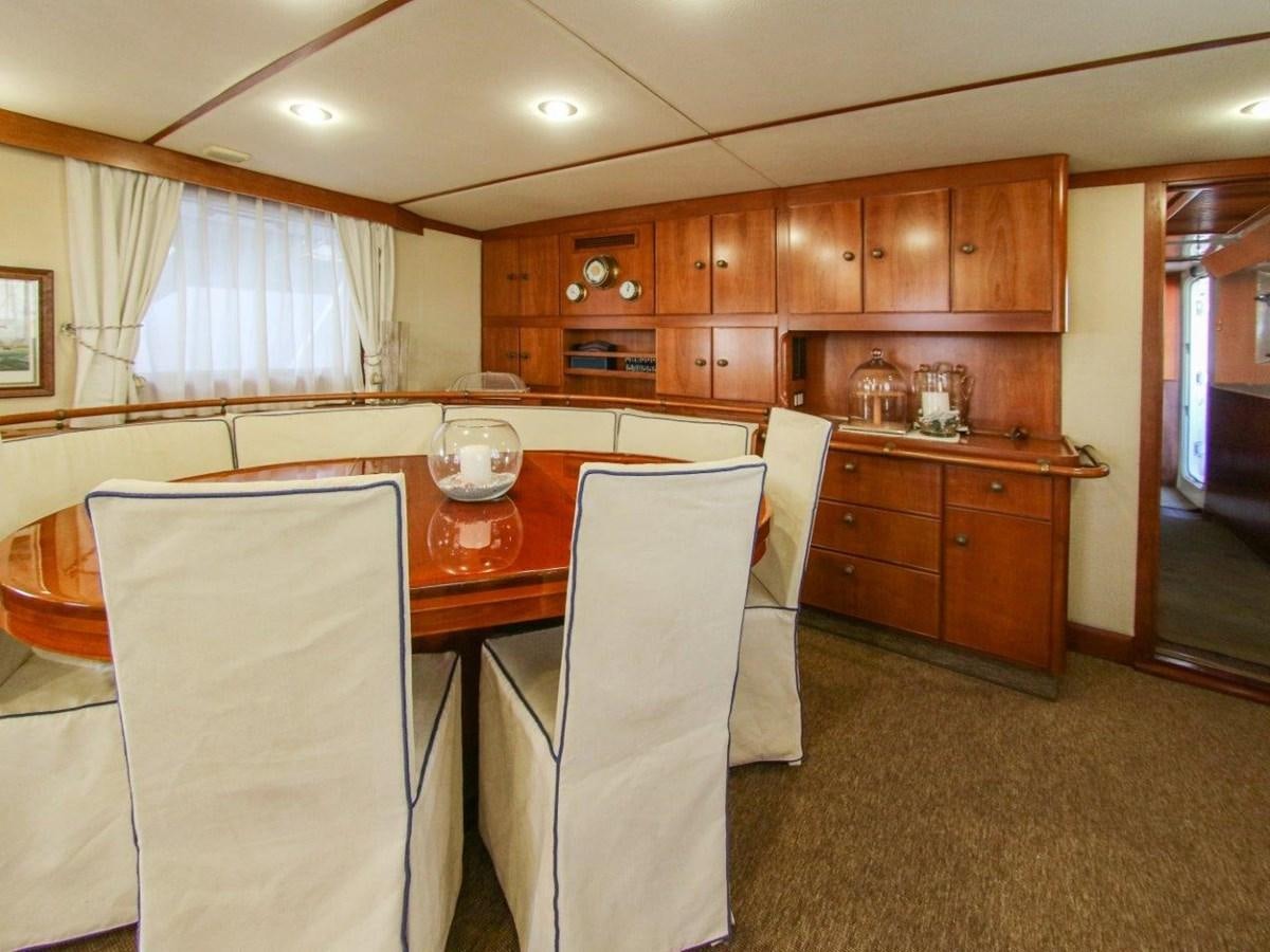 a kitchen with wooden cabinets aboard LADY ECOSSE Yacht for Sale