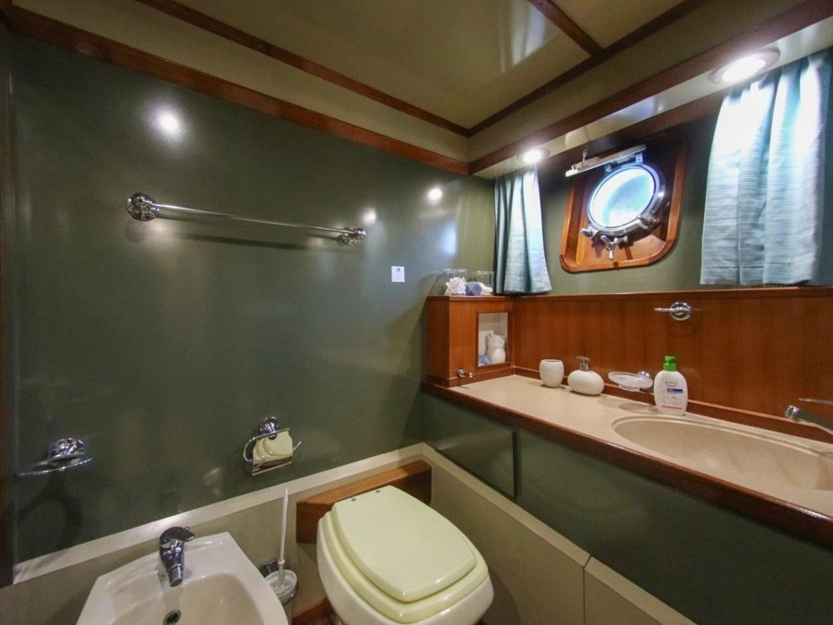 a bathroom with a large mirror aboard LADY ECOSSE Yacht for Sale
