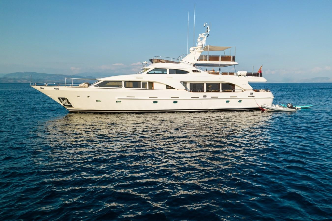 a white boat in the water aboard ENDLESS SUMMER Yacht for Sale