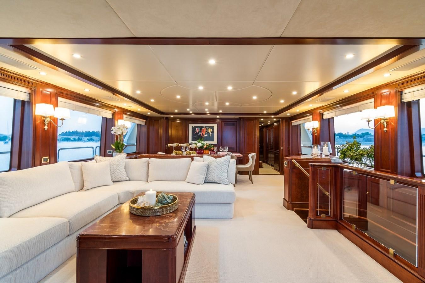 a living room with a white couch aboard ENDLESS SUMMER Yacht for Sale