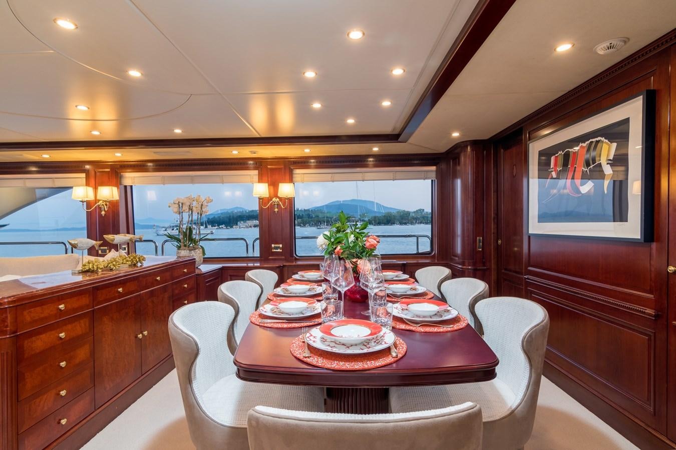 a dining room with a table and chairs aboard ENDLESS SUMMER Yacht for Sale