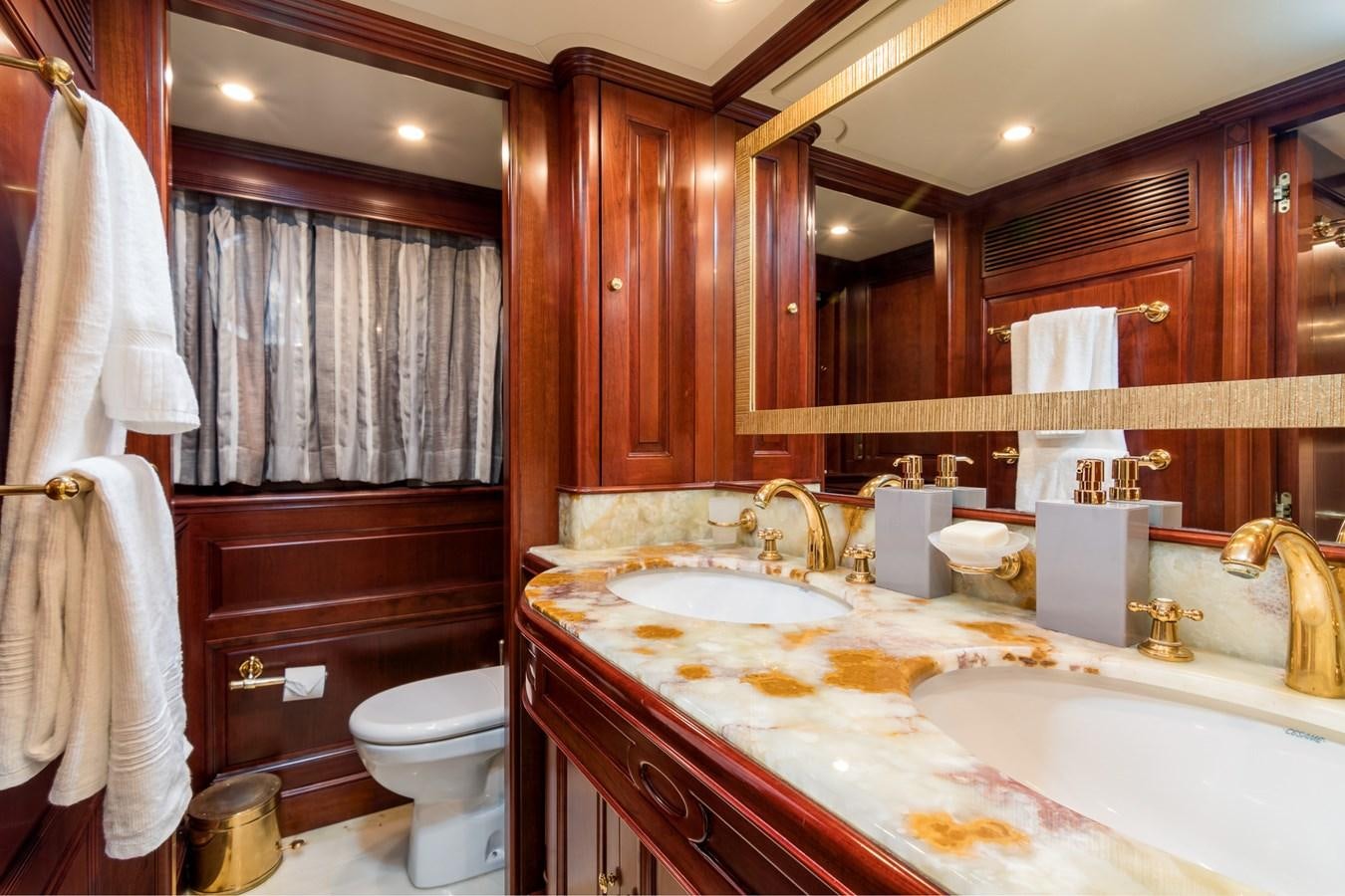 a bathroom with a sink and a toilet aboard ENDLESS SUMMER Yacht for Sale