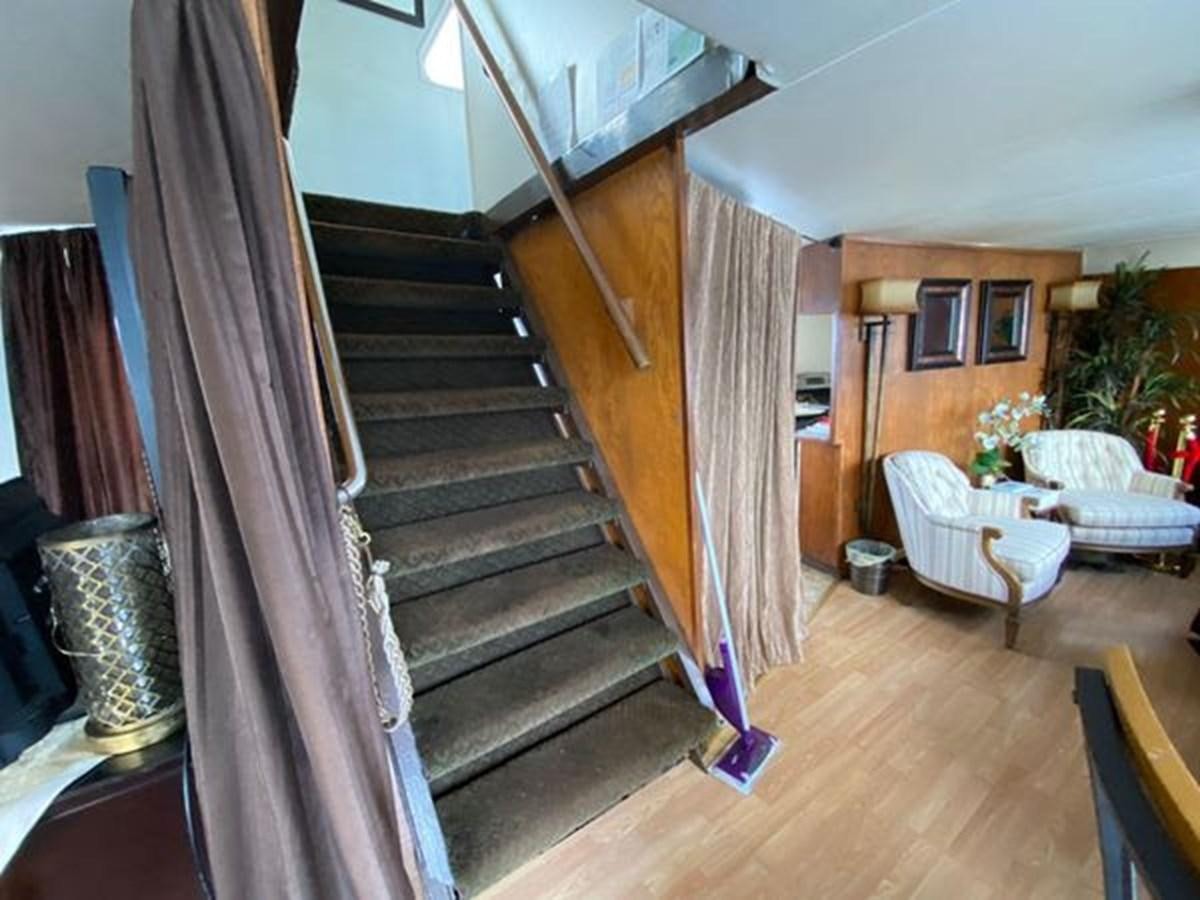 a staircase in a house aboard 1986 CUSTOM SEA TREK PASSENGER VESSEL Yacht for Sale