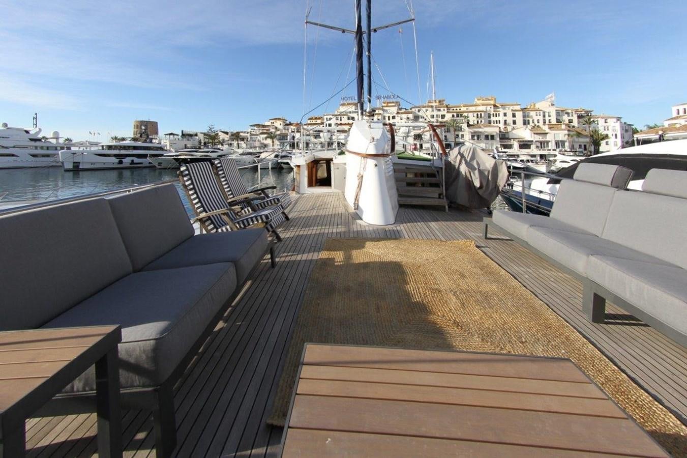 a deck with a deck and boats aboard COLUMBUS Yacht for Sale