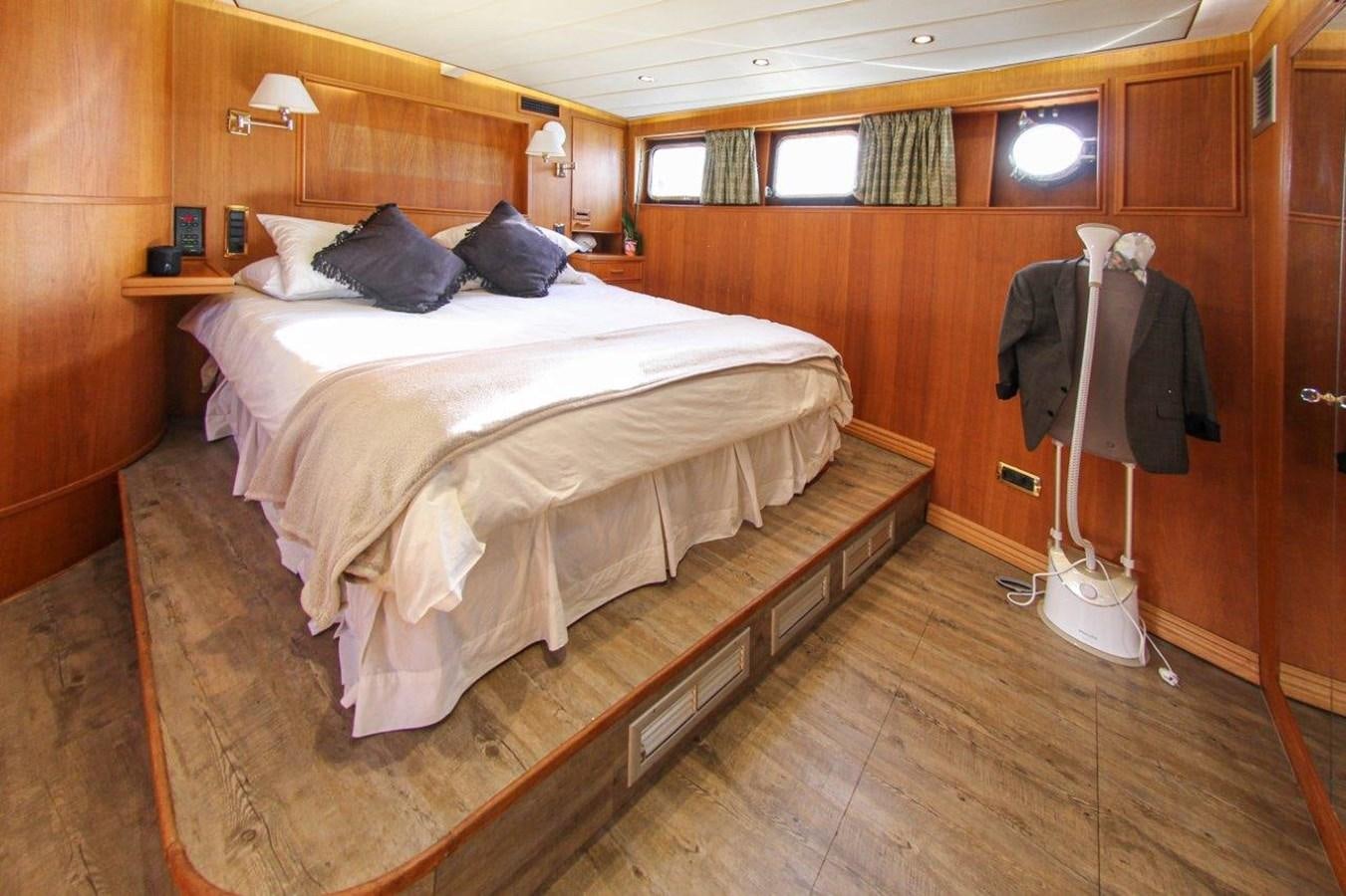a bed in a room aboard COLUMBUS Yacht for Sale