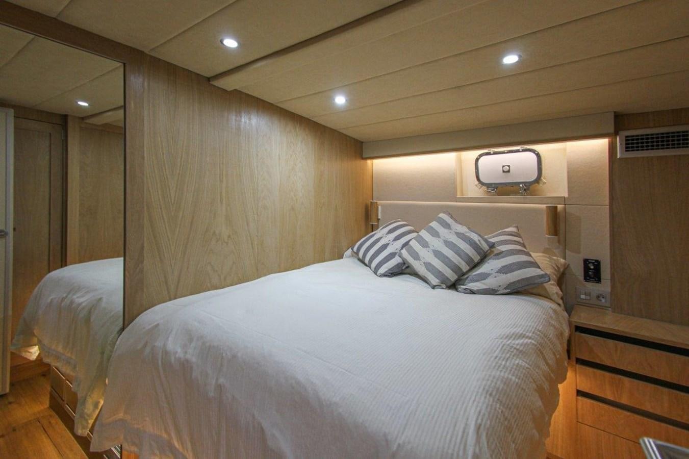 a bed in a room aboard COLUMBUS Yacht for Sale