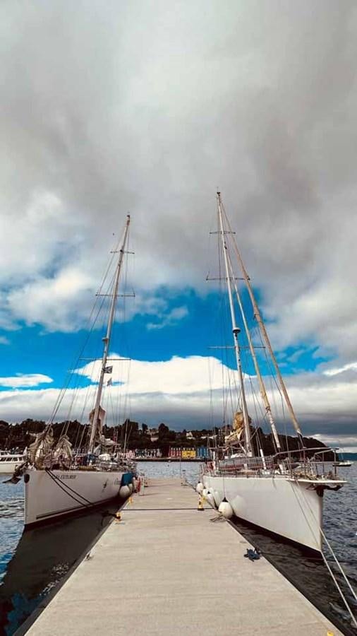 boats docked at a pier aboard IRONBARQUE Yacht for Sale