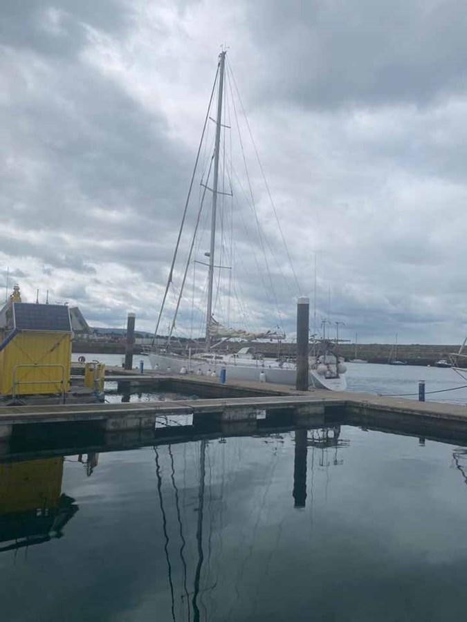 a large crane on a dock aboard IRONBARQUE Yacht for Sale