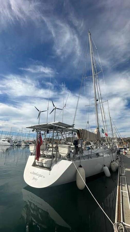 a boat docked at a pier aboard IRONBARQUE Yacht for Sale
