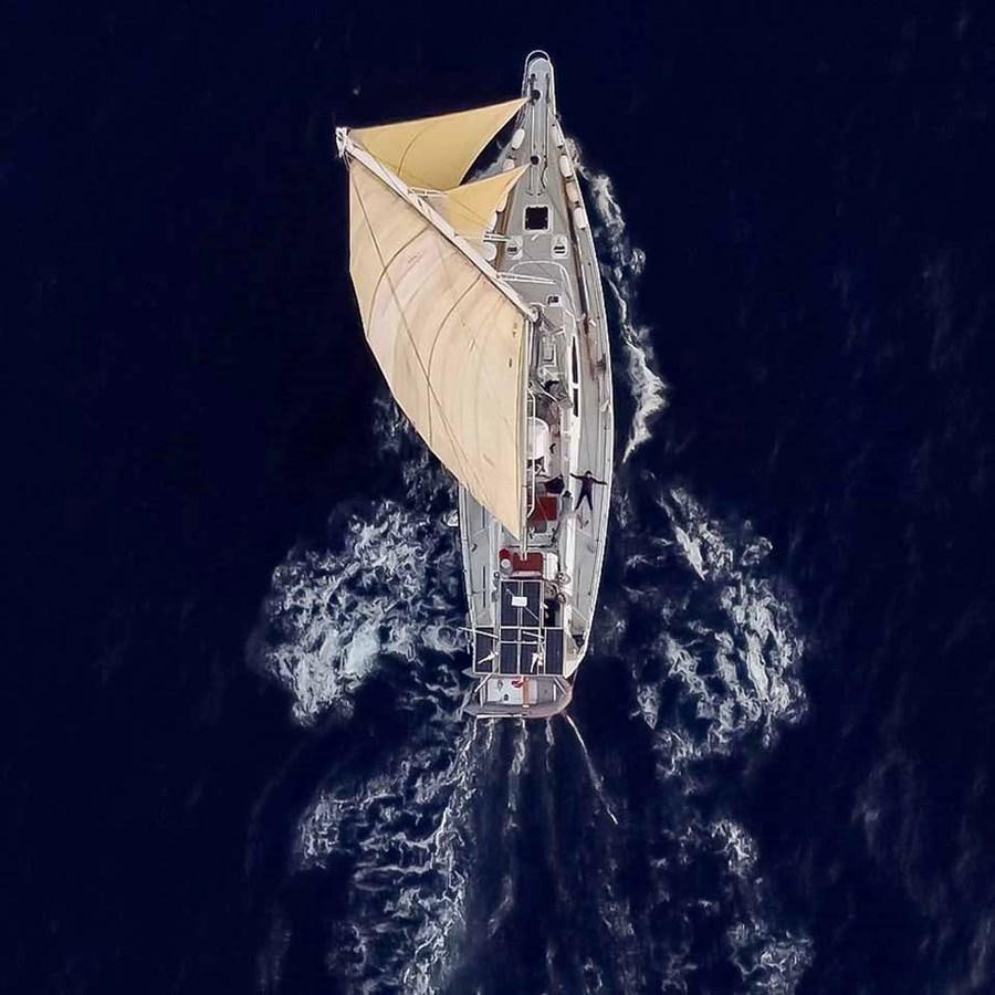 a space shuttle in space aboard IRONBARQUE Yacht for Sale