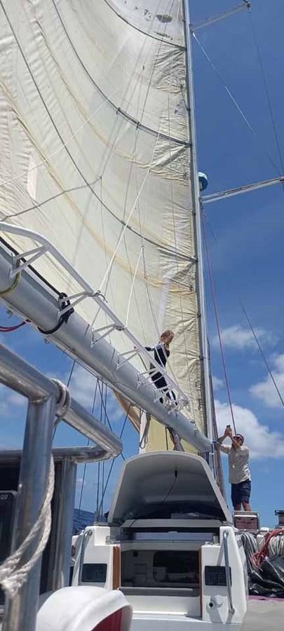 a person standing on a sailboat aboard IRONBARQUE Yacht for Sale