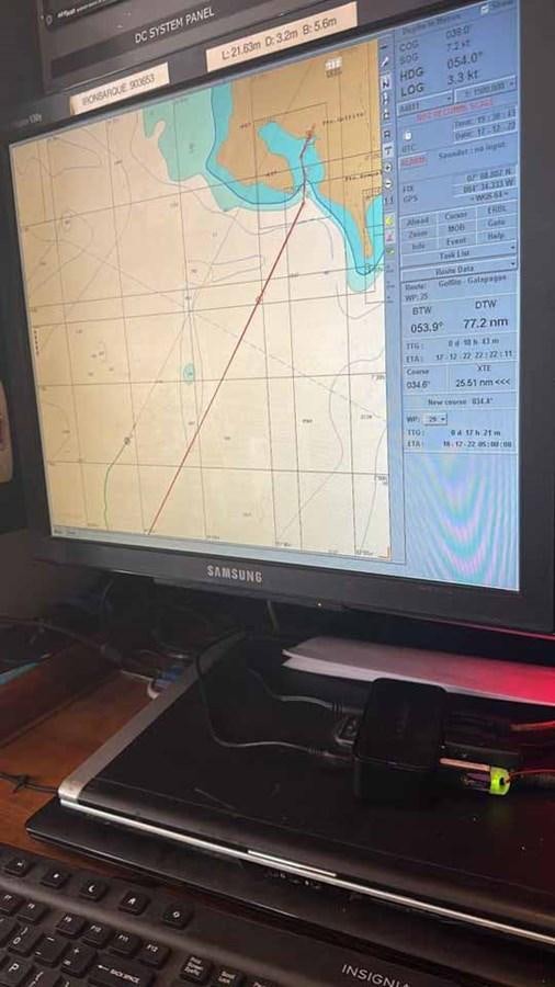 a screen with a map on it aboard IRONBARQUE Yacht for Sale