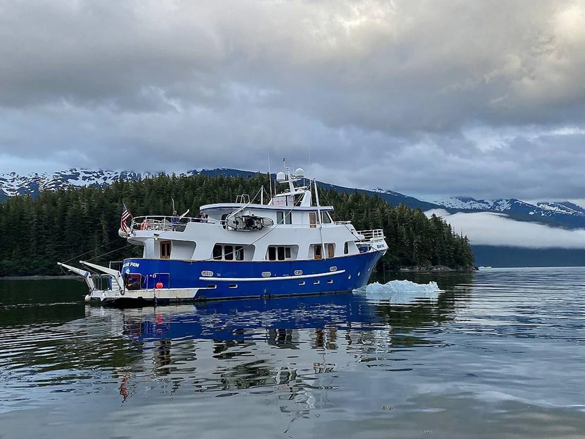 a boat on the water aboard BEAR PAW Yacht for Sale