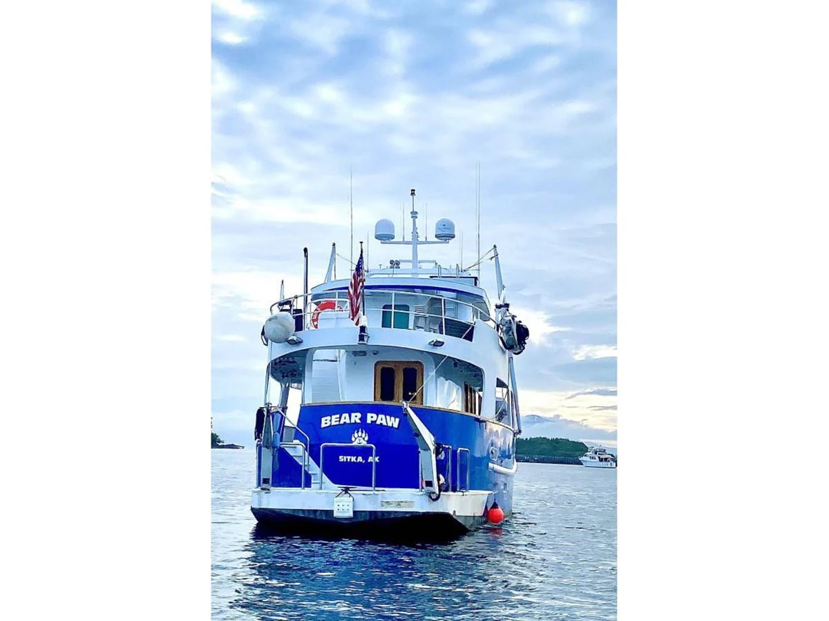 a boat in the water aboard BEAR PAW Yacht for Sale