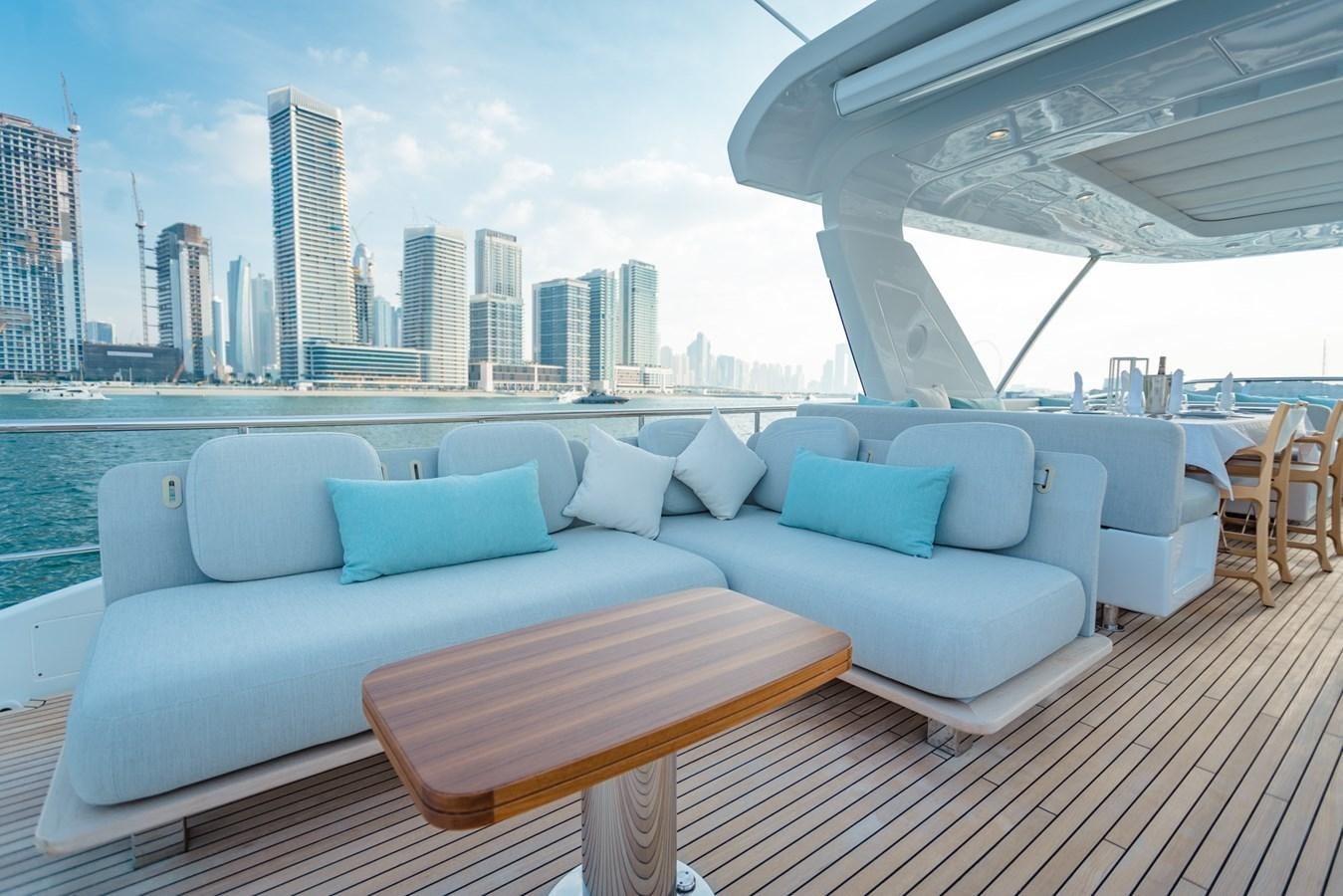 a couch on a deck aboard ATLANTIS Yacht for Sale