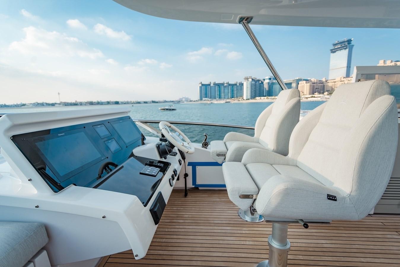 a deck with a deck and boats on it aboard ATLANTIS Yacht for Sale