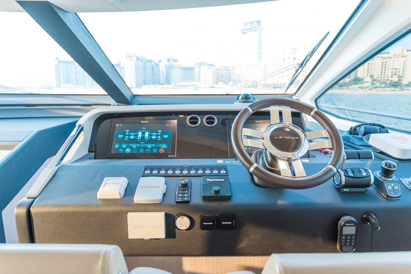 the inside of a car aboard ATLANTIS Yacht for Sale