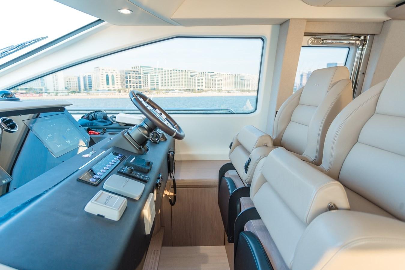 inside of a car aboard ATLANTIS Yacht for Sale