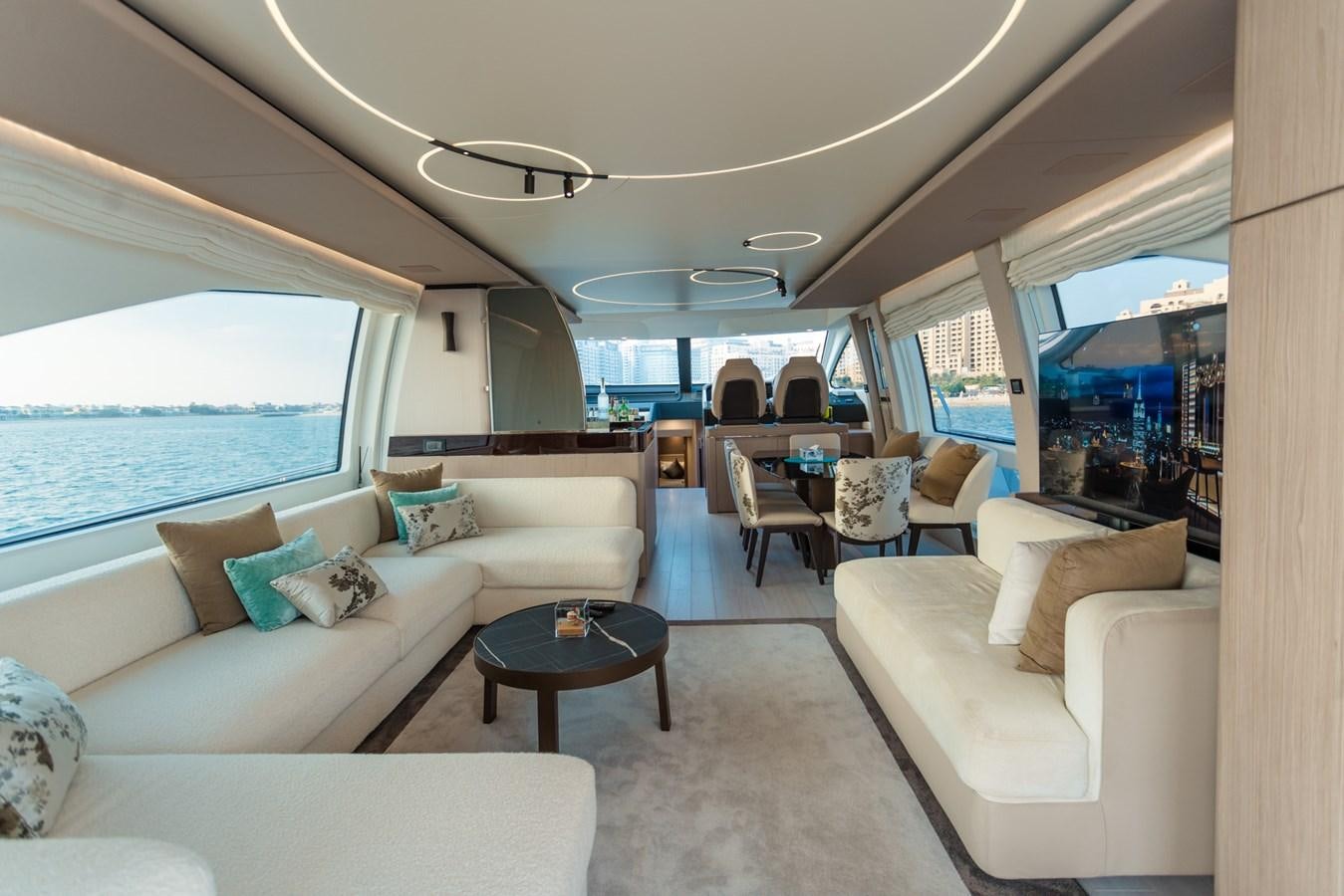 a living room with a large window aboard ATLANTIS Yacht for Sale