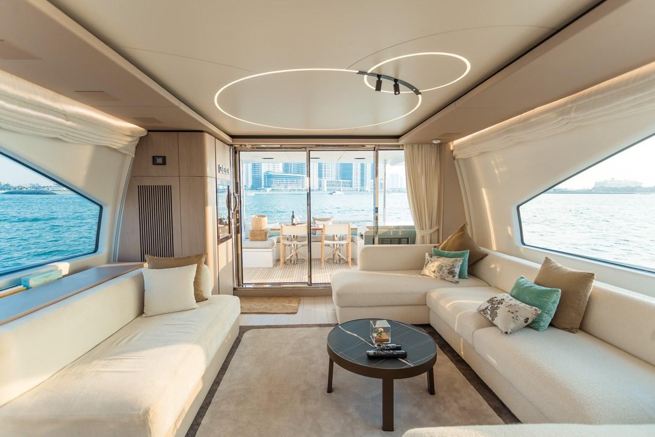 a living room with a couch and a table aboard ATLANTIS Yacht for Sale