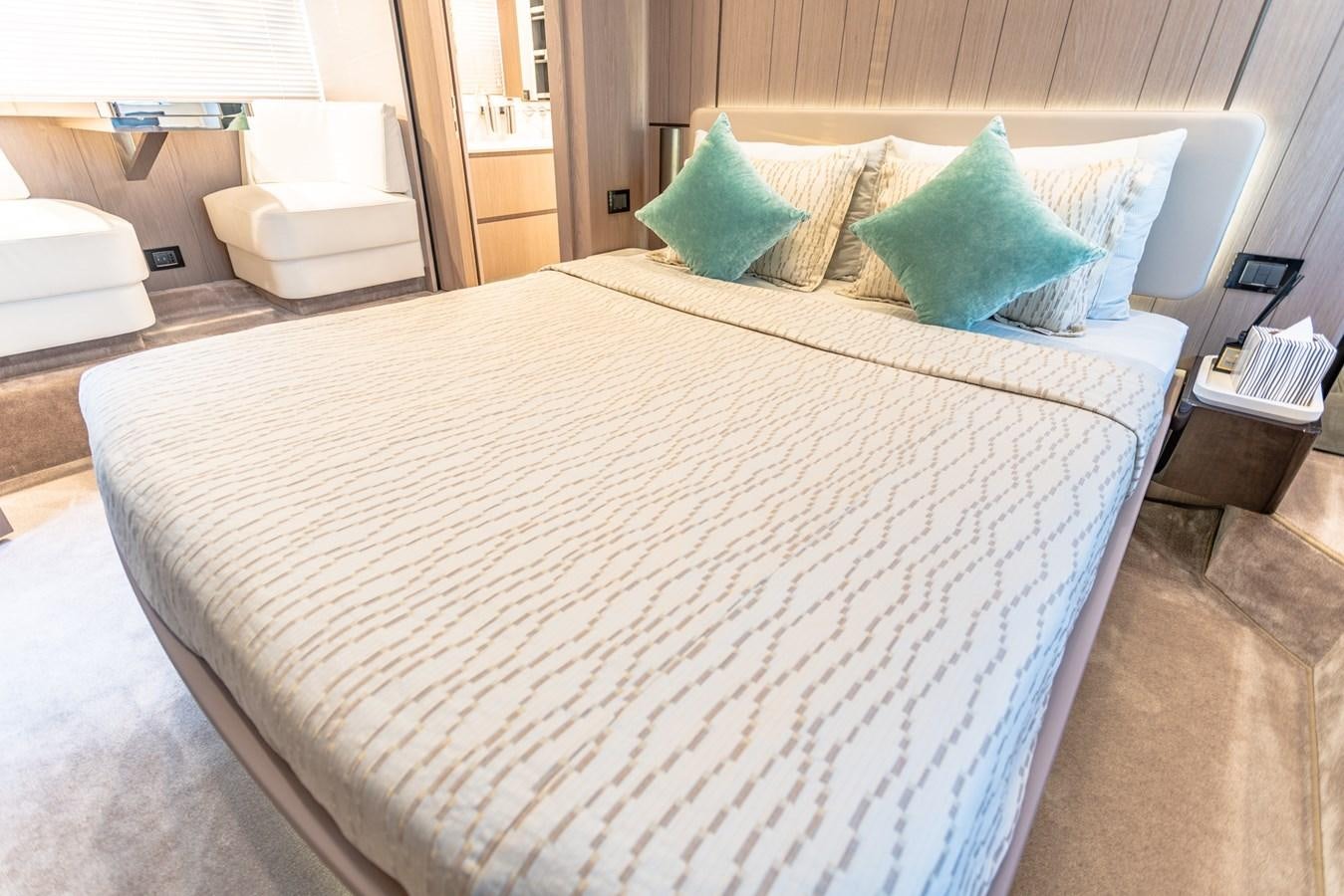 a bed with pillows aboard ATLANTIS Yacht for Sale