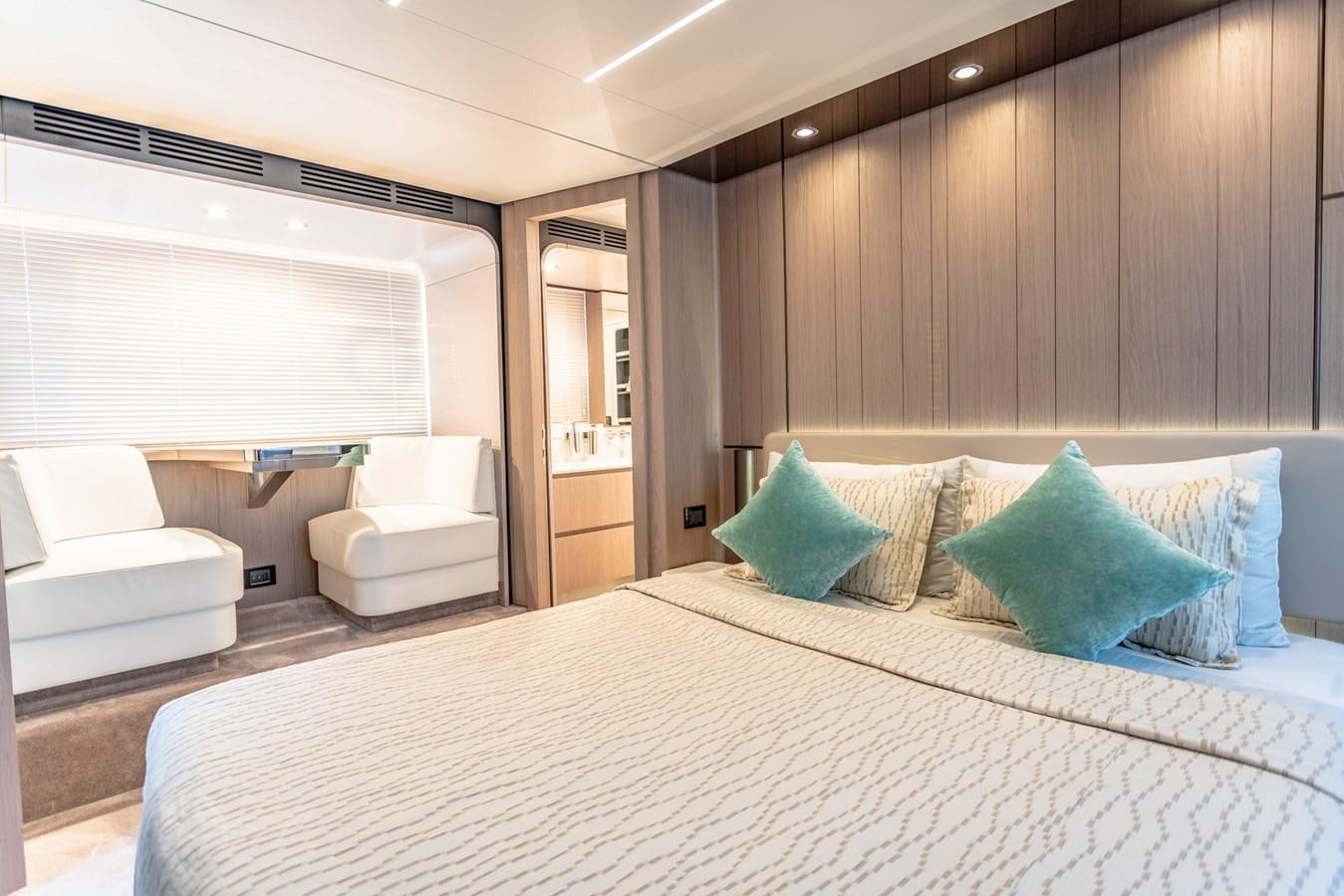 a large bed in a room aboard ATLANTIS Yacht for Sale