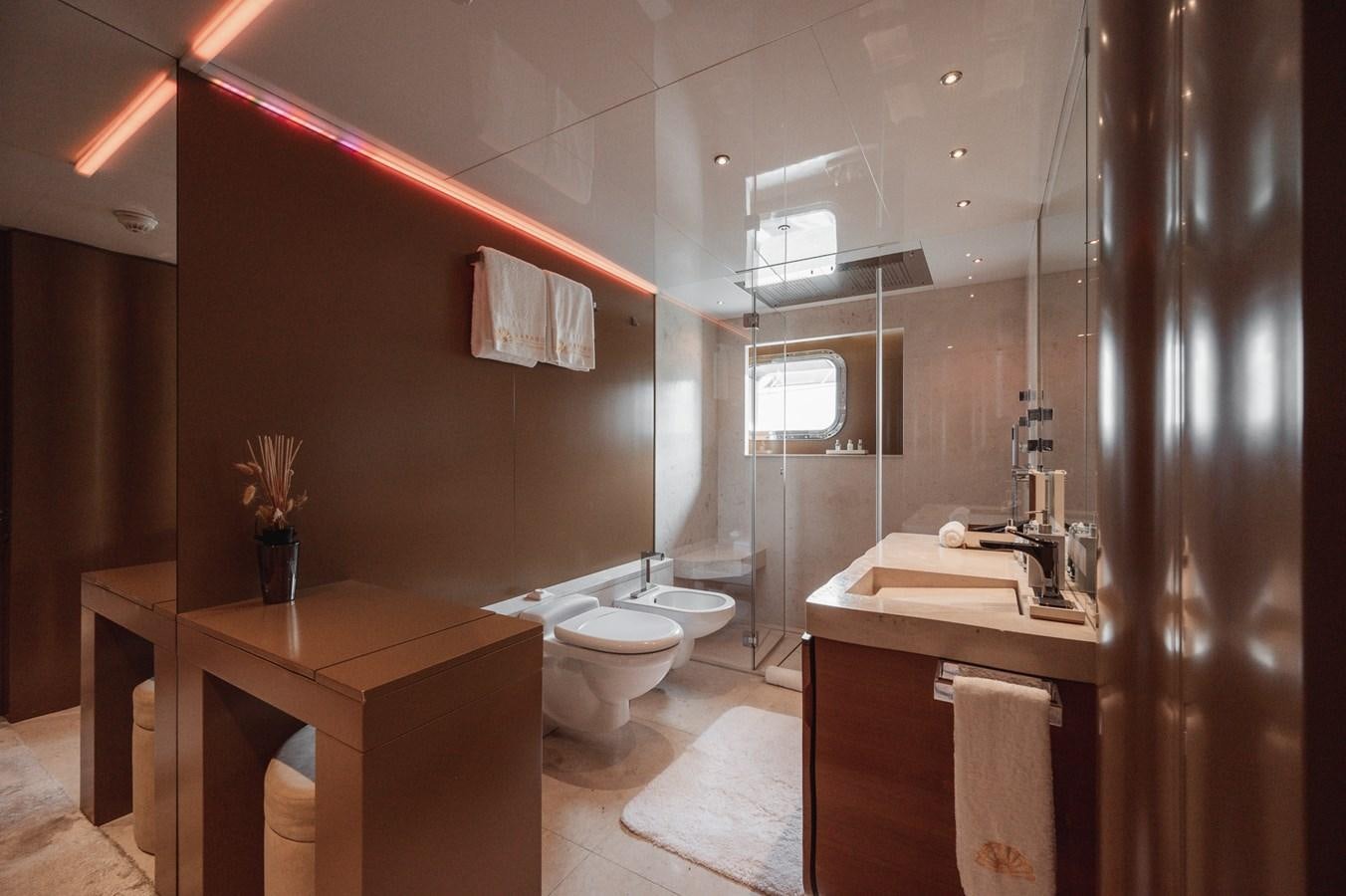 a bathroom with a toilet and sink aboard NONNI II Yacht for Sale