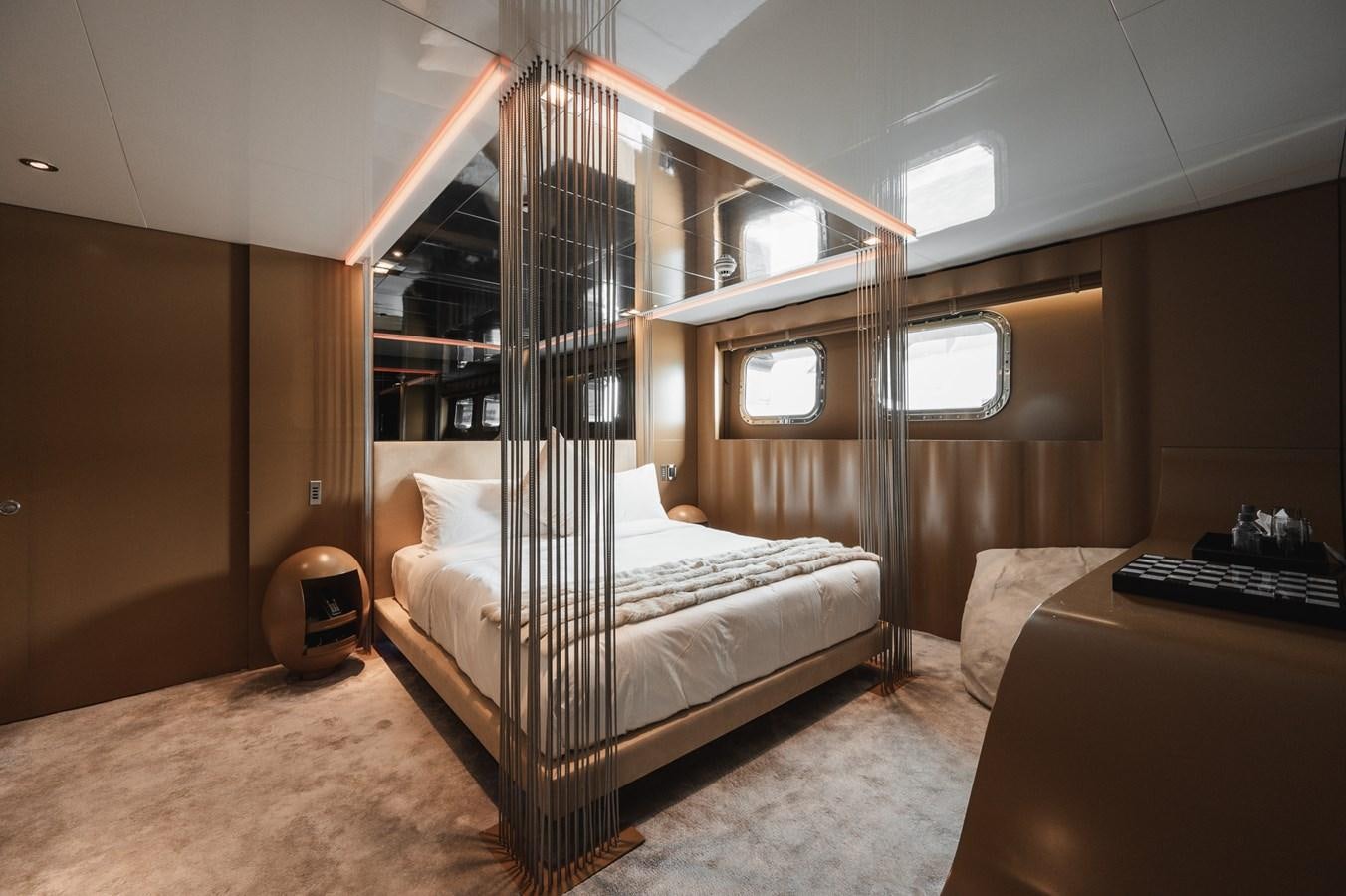 a bed in a room aboard NONNI II Yacht for Sale