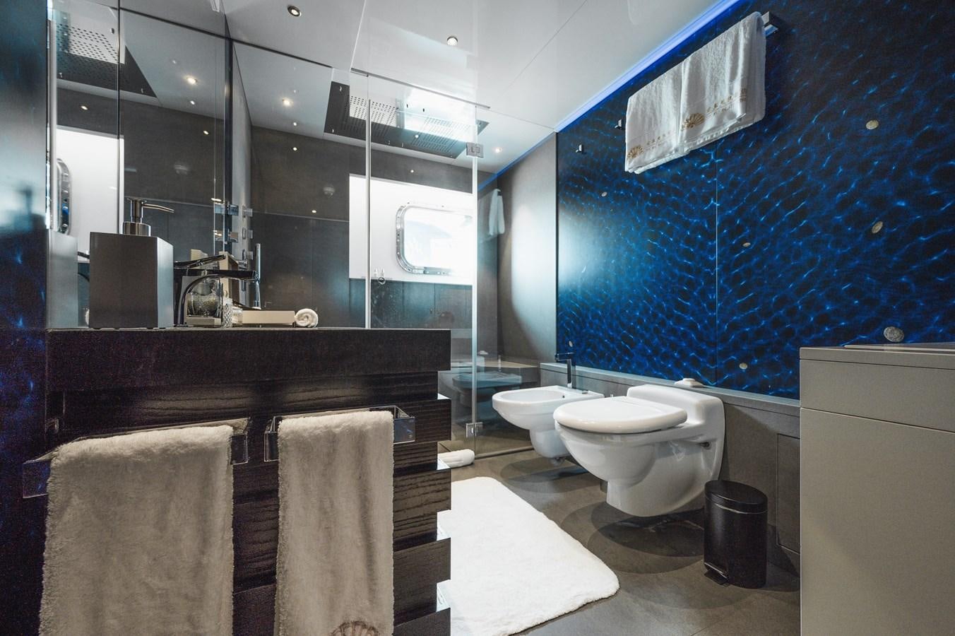 a bathroom with a toilet and a sink aboard NONNI II Yacht for Sale