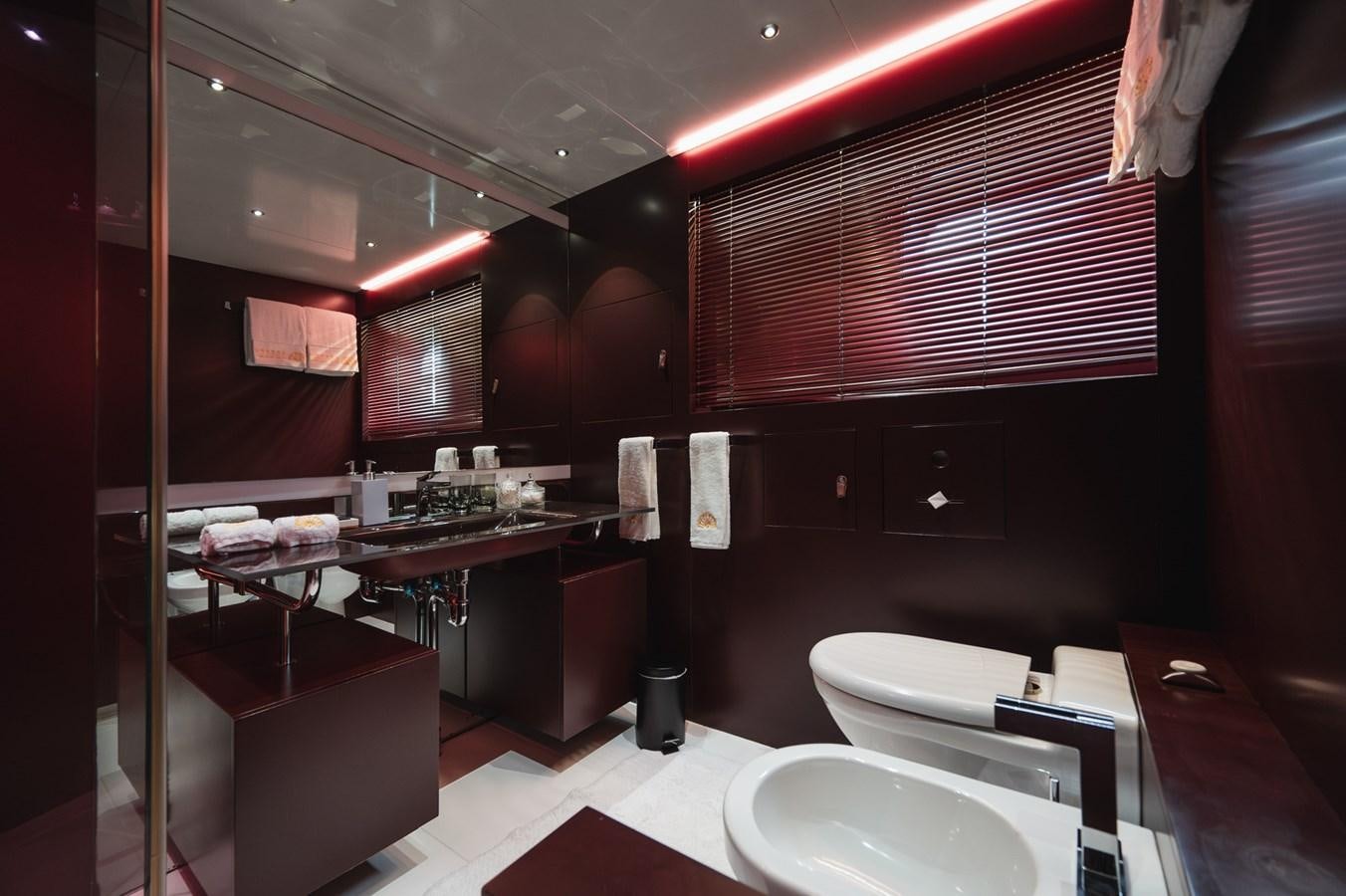 a bathroom with a sink and a toilet aboard NONNI II Yacht for Sale
