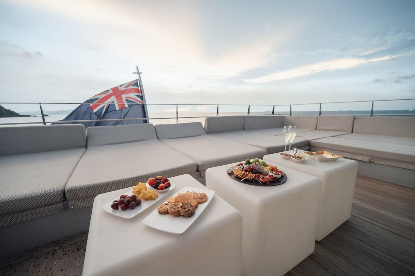 a table with food on it aboard NONNI II Yacht for Sale