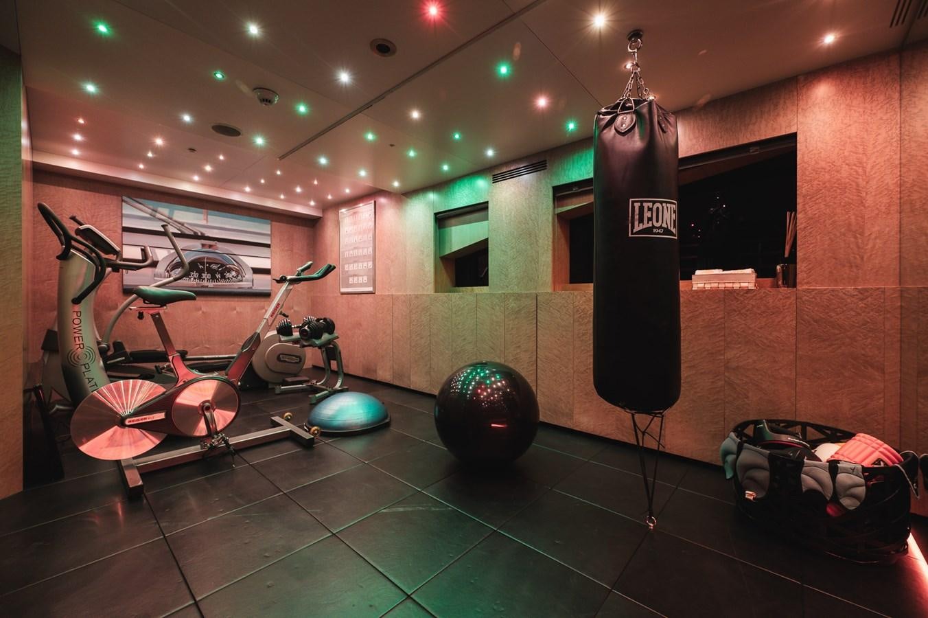 a room with a robot and a drum set aboard NONNI II Yacht for Sale