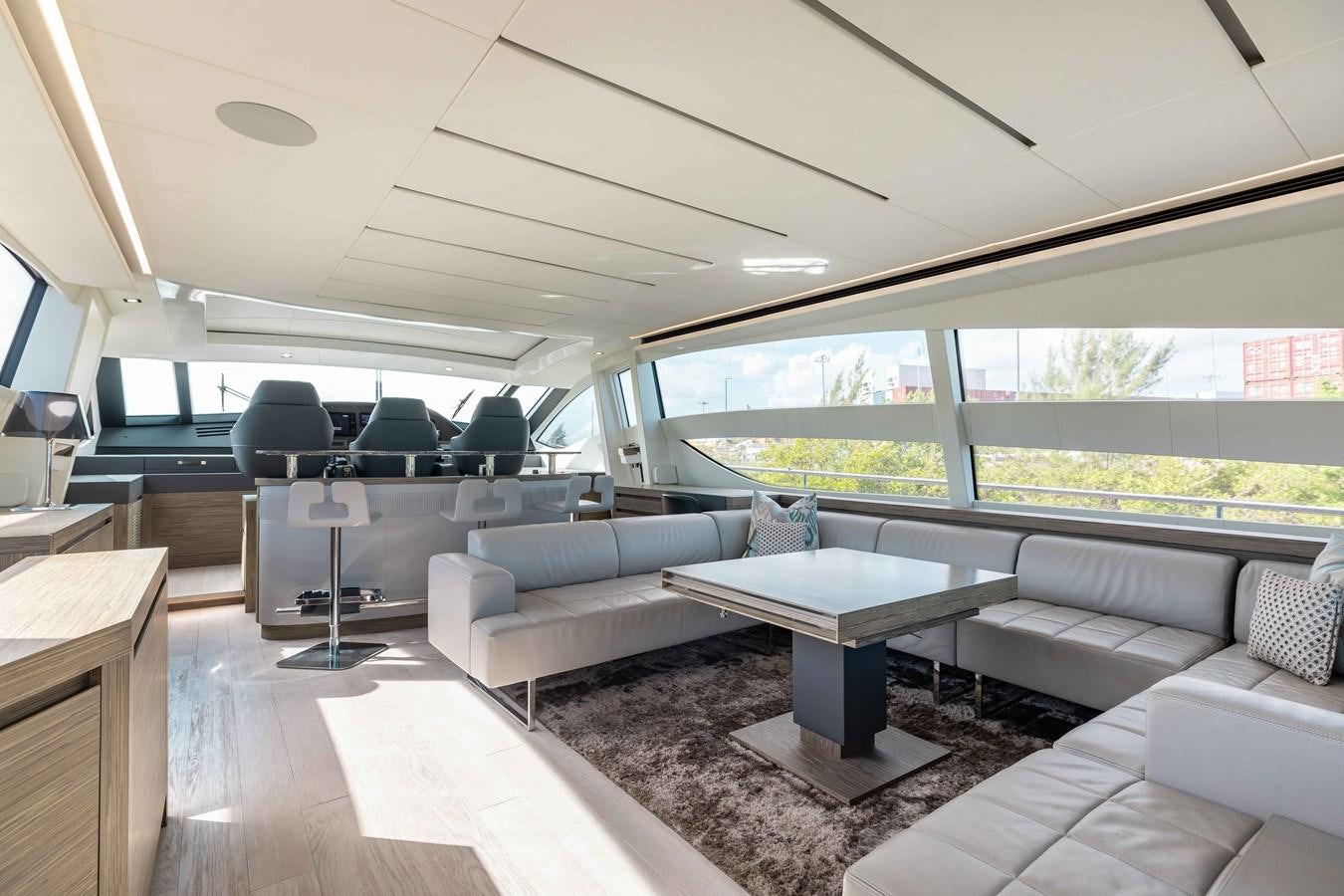 a room with a couch and a table aboard AFRICAN WILD DOG Yacht for Sale