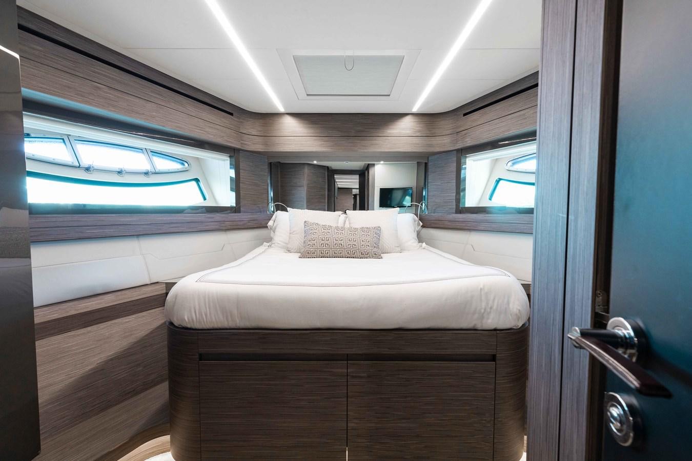 a bed in a room aboard AFRICAN WILD DOG Yacht for Sale