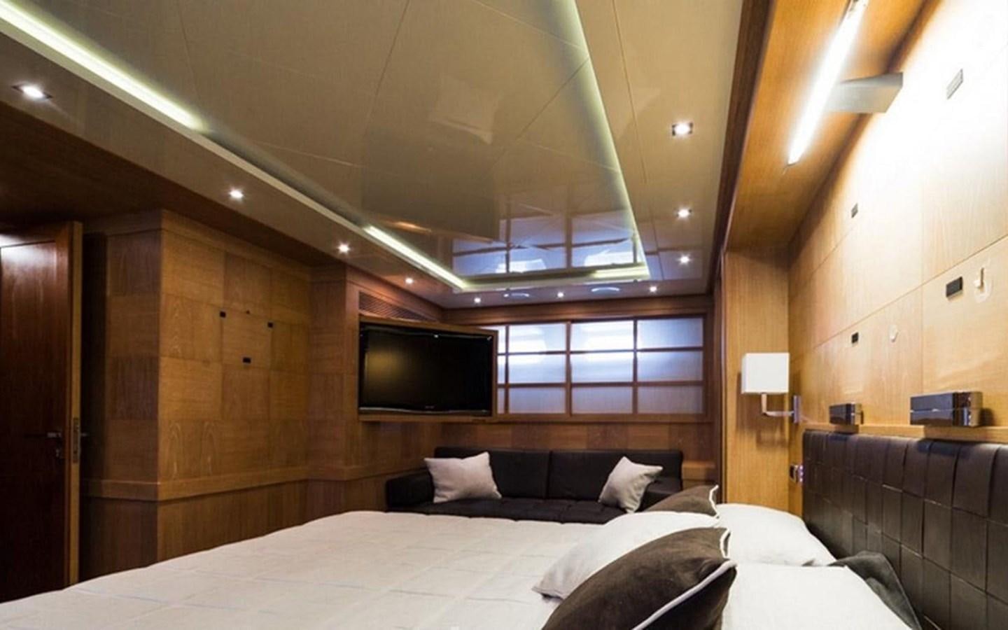 a bed in a room aboard ZOO Yacht for Sale