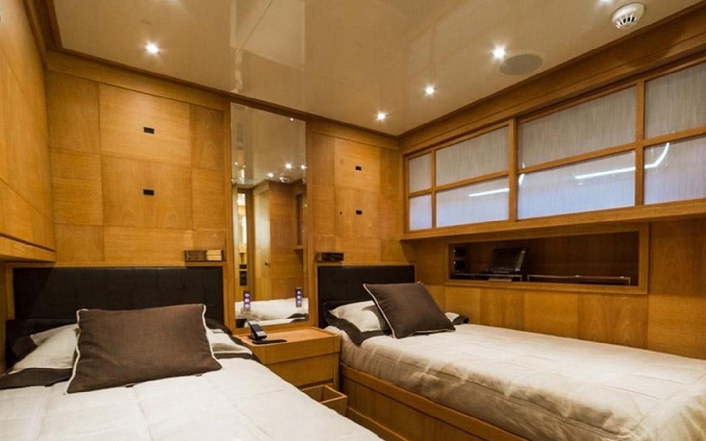 a room with two beds aboard ZOO Yacht for Sale
